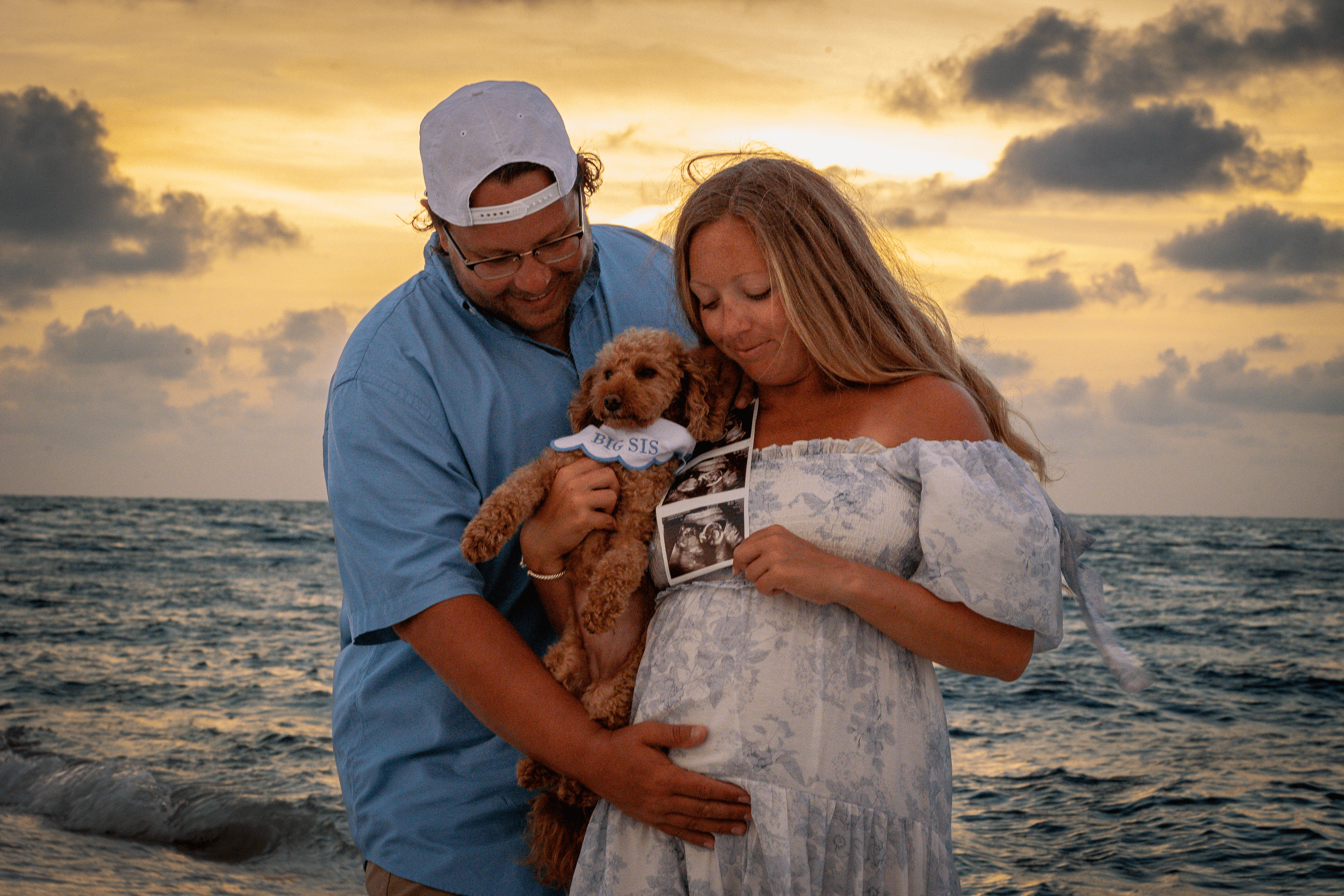 Playful maternity beach portrait